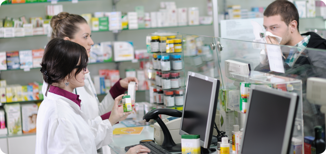 pharmacist assisting customer