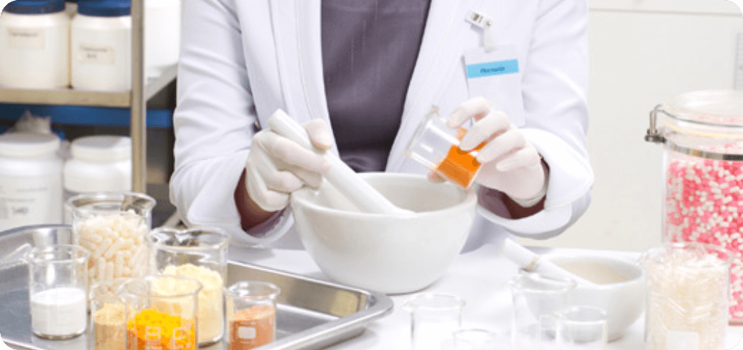 a pharmacist man in a laboratory