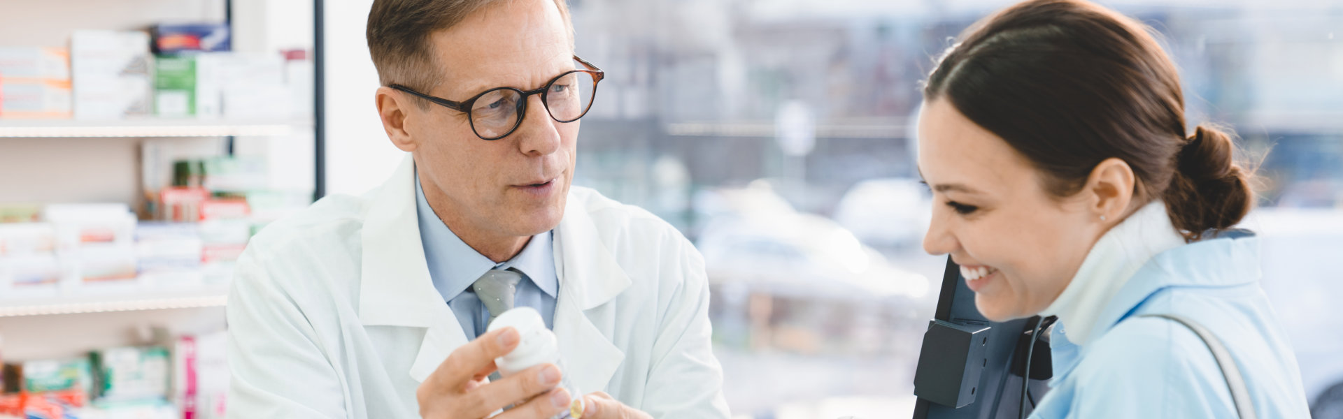 pharmacist talking to a woman
