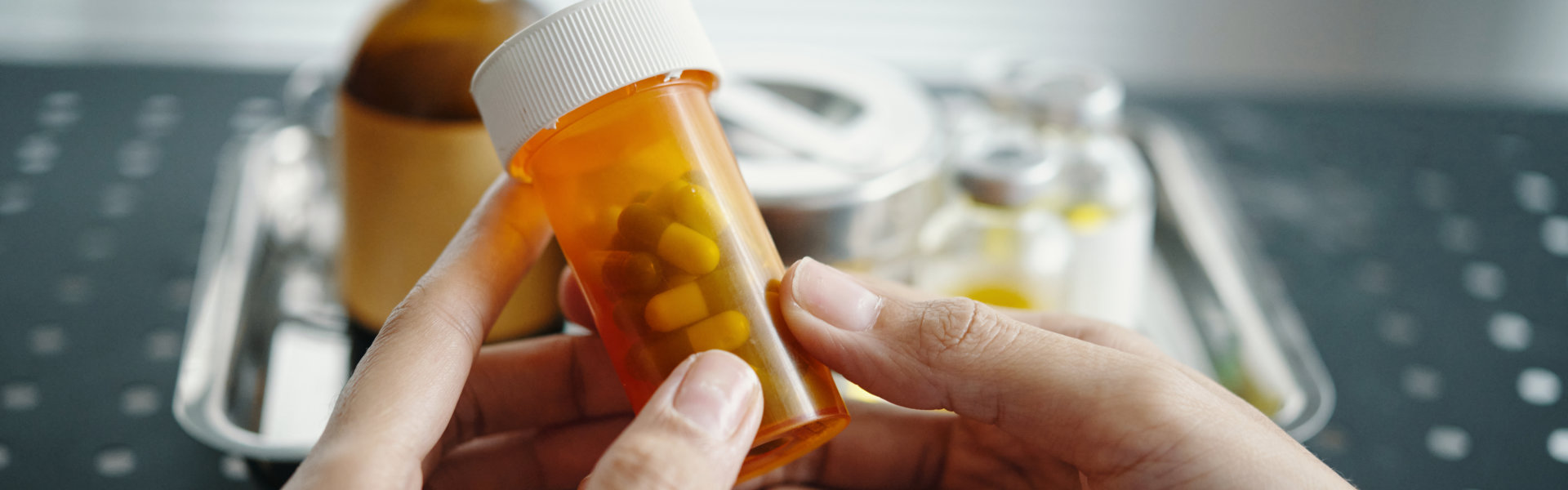 person holding a medicine